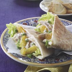 Chicken, lettuce, Florida orange and peas in pita
