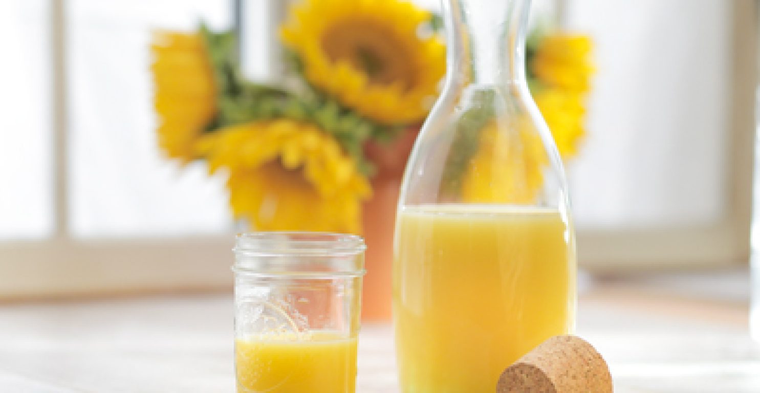 Orange juice in carafe with glass image