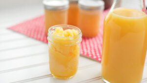 orange juice frozen in a mason jar
