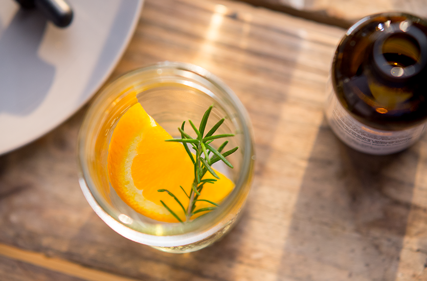 Orange Rosemary Citronella Candle 1 orange and rosmary in glass 1