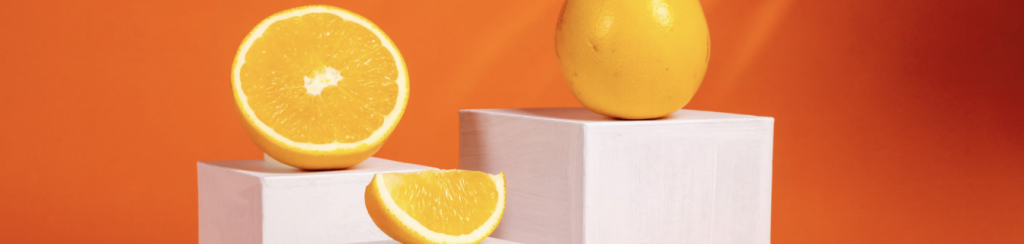 3 oranges on 3 pedestals